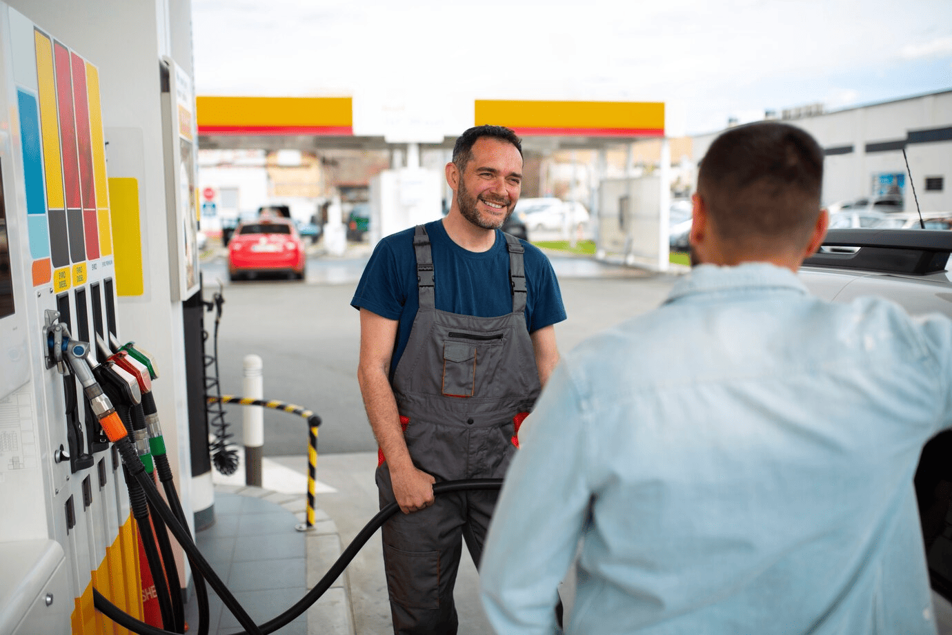 Vector illustration of a fuel pump at a gas station
