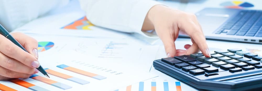 Professional working on tax preparation with documents